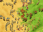 Zwei m&auml;chtige Armeen prallen aufeinander. Angeblich soll [i]Age of Mythology[/i] genauso gro&szlig;e Verb&auml;nde darstellen k&ouml;nnen wie [i]Age of Empires 2[/i] - und das in 3D! Ob das allerdings auch auf schw&auml;cheren Rechnern in diesem Detailgrad (beachten Sie die Spuren im Sand!) funktioniert, wagen wir zu bezweifeln.