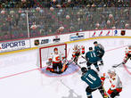 Die San Jose Sharks erhöhen auf 2:0, der Keeper der Calgary Flames kann dem Puck nur noch nachschauen.