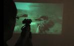Mit dem PicoP wird Operation Flashpoint: Dragon Rising an eine Wand gestrahlt. Mit dem PicoP wird Operation Flashpoint: Dragon Rising an eine Wand gestrahlt.