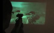 Mit dem PicoP wird Operation Flashpoint: Dragon Rising an eine Wand gestrahlt.