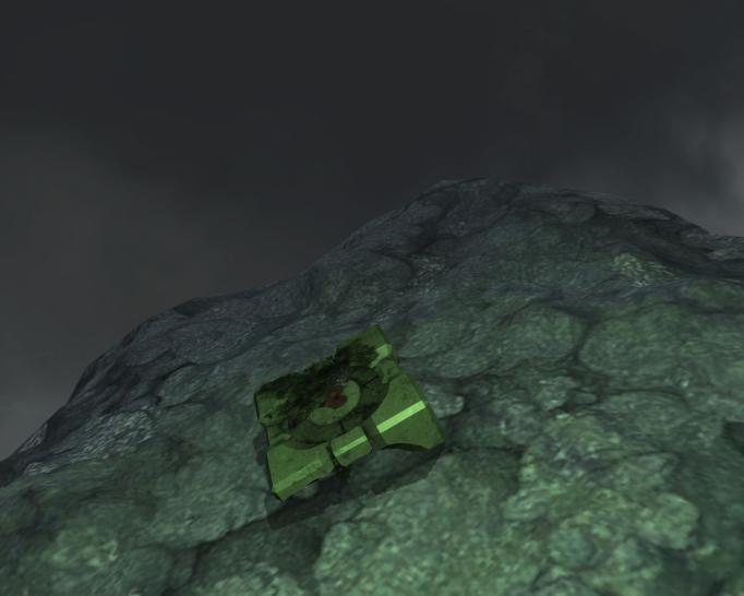 [28/07/09] Heathens Kammer: "Laufen Sie den Berg mit der Höhle drin hinauf. Oben finden Sie ein Fragment des Companion Cubes aus Half-Life: Portal sowie eine Tonband-Aufnahme, die von "Nano-Brot" berichtet. Es gibt ein zweites Fragment des Companion Cubes in The Void (siehe späteres Bild). 