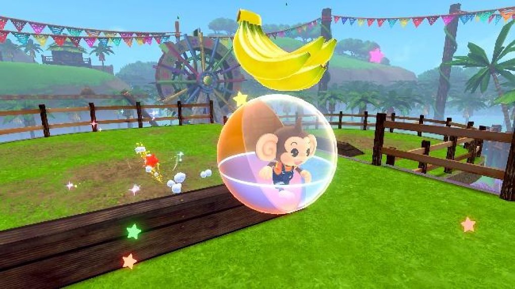 Der Affe AiAi sammelt eine Banane ein.