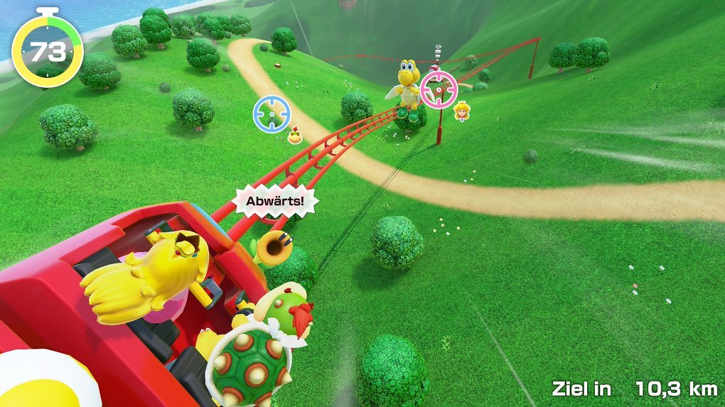 Peach und Bowser Junior zielen auf einen Koopa