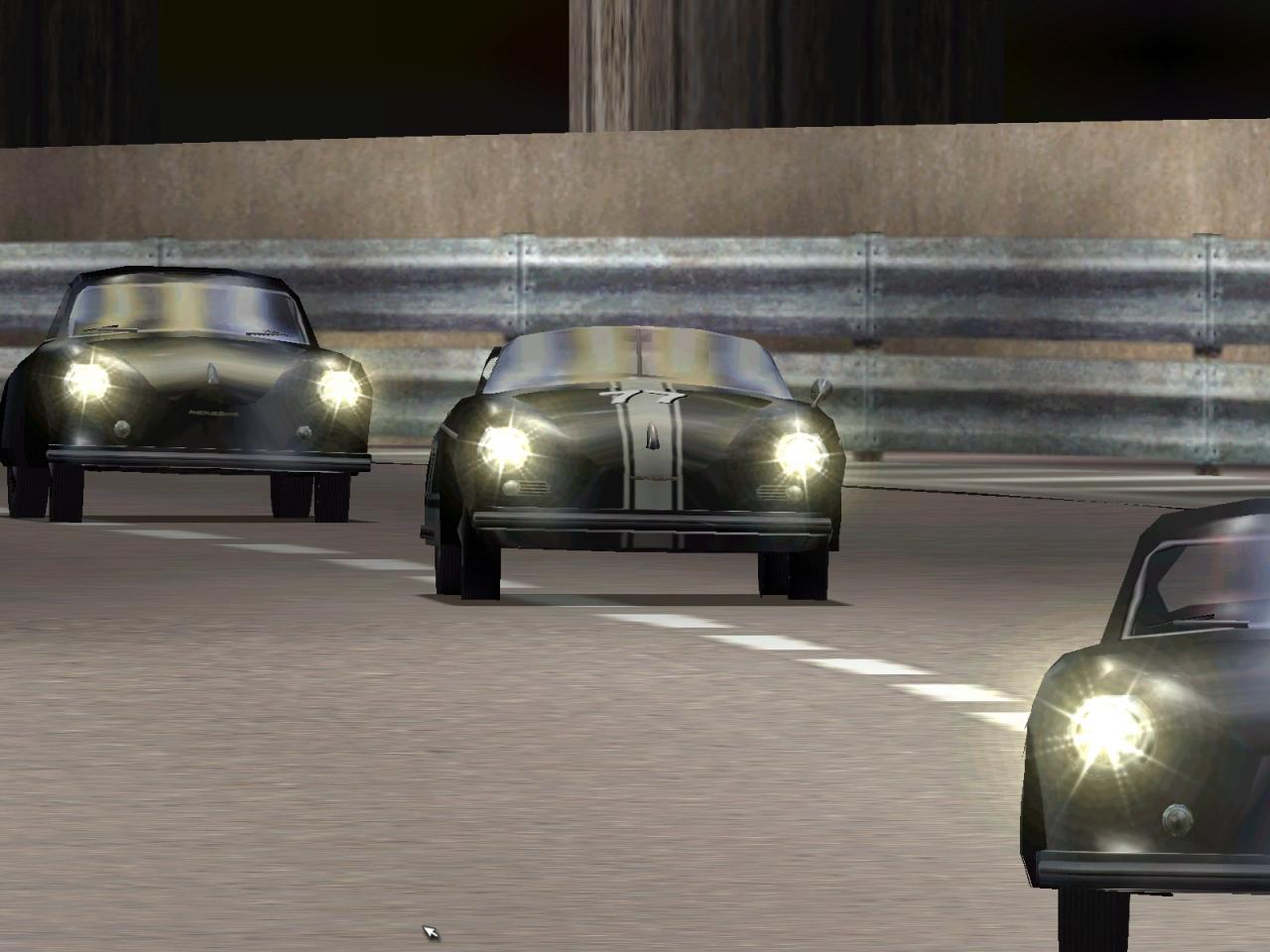 [26/11/2001] MEN IN BLACK Im Tunnel von Monte Carlo blenden diese beiden Sportwagenraritäten die Scheinwerfer auf.