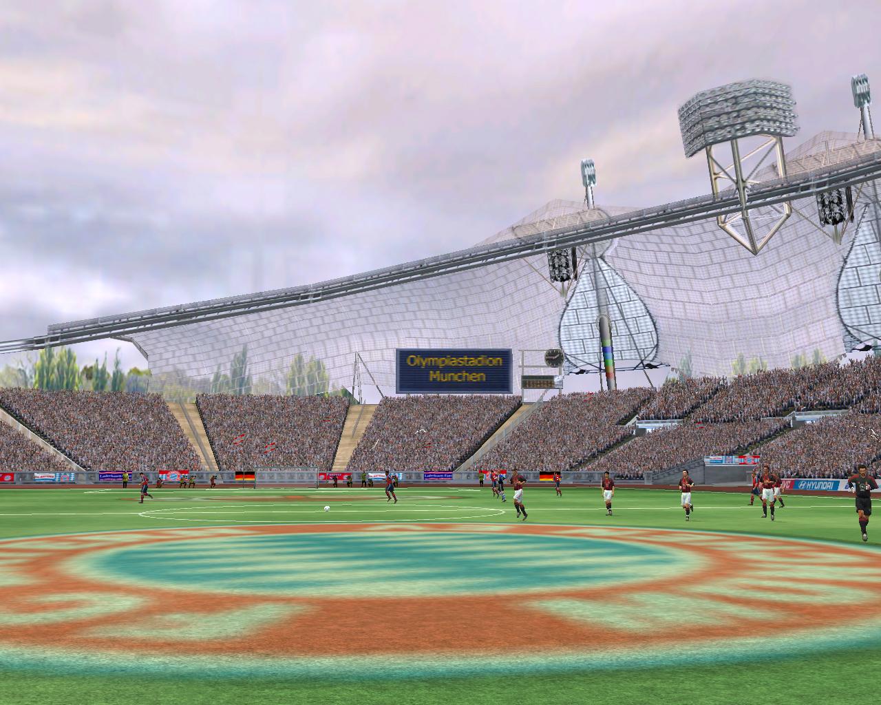 [15/11/2002] Ein großes Zelt: Angesichts der pompösen Architektur des Münchner Olympiastadions, wäre der Schriftzug auf der Anzeigetafel fast überflüssig.
