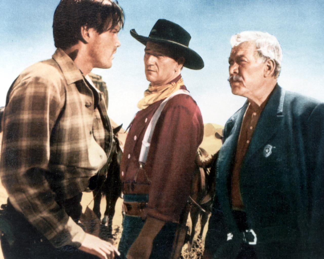 [02/10/2008] Ethan Edwards (John Wayne, M.) in Auseinandersetzung mit seinem Neffen (l.) und dem Pastor (r.)