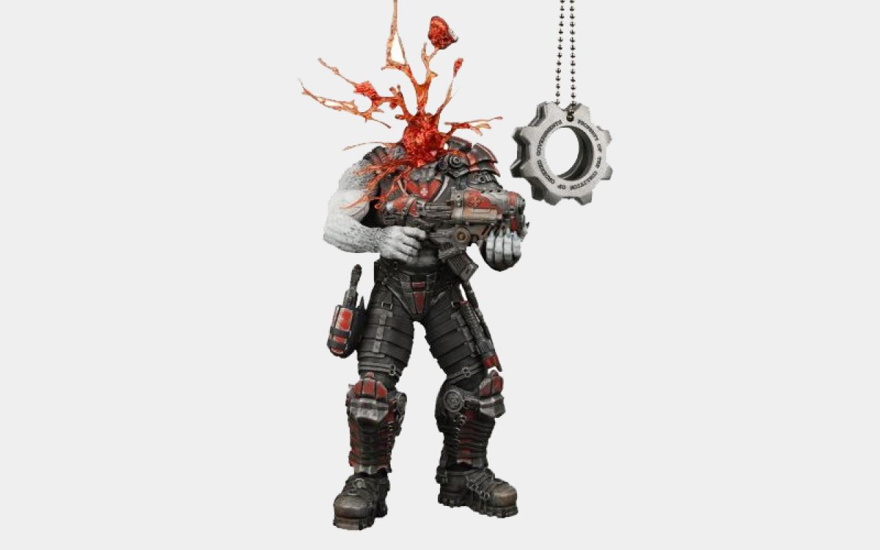[08/09/2009] Epic-Shooter-Figur >>> Bei dieser Figur gilt das Motto: Es überzeugt die Ästhetik der Hässlichkeit. Für all jene, die nicht stundenlang einen geplatzten Kopf anschauen wollen, wird ein intakter Schädel mitgeliefert. Figuren-Größe: Ca. 17 cm. Kosten: 19,98 Euro plus Versandkosten, Shop-Link: Epic-Shooter-Figur.