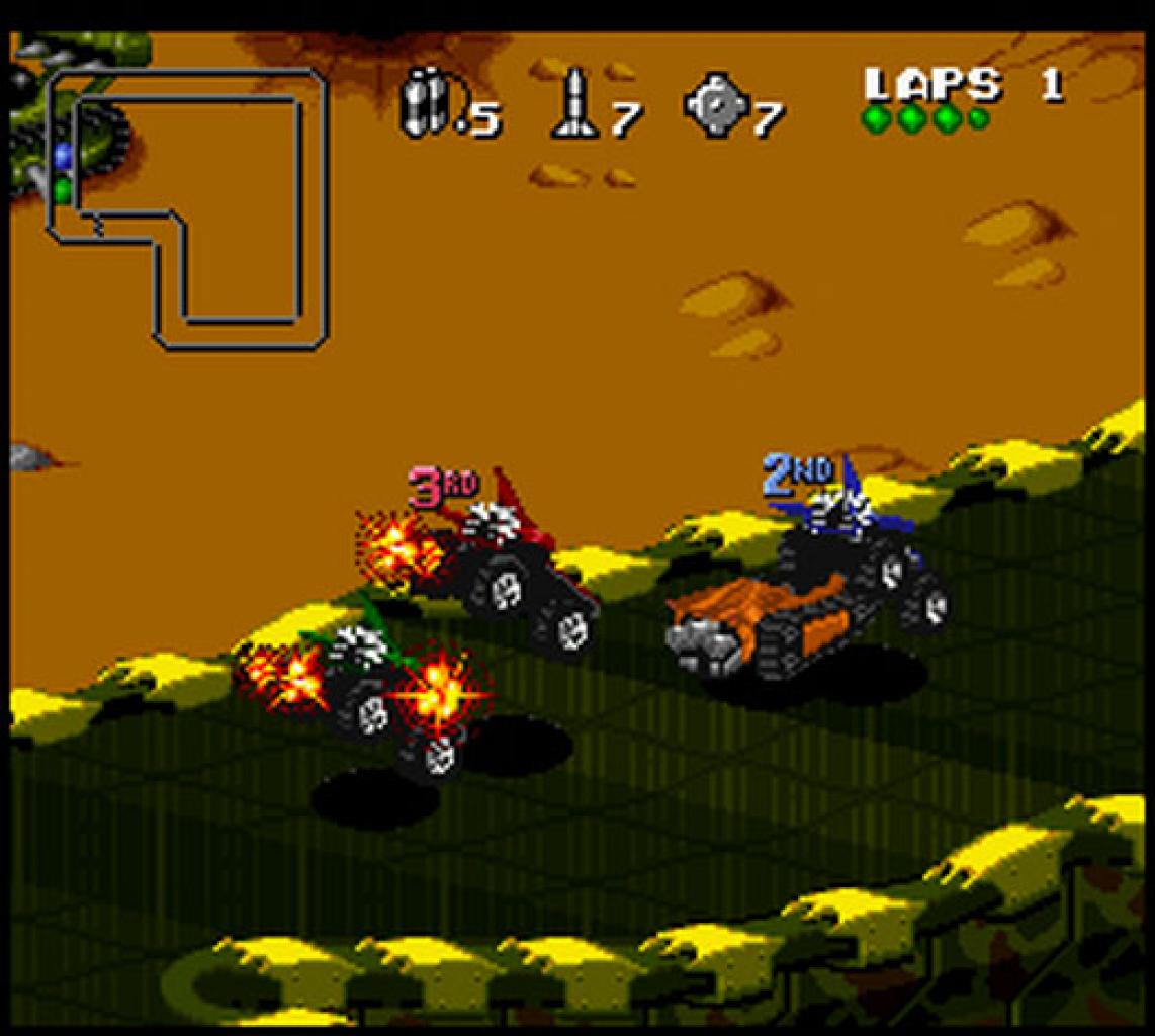 [16/04/2010] 1993: Rock N' Roll Racing erinnert auf den ersten Blick an Micro Machines. Sie versuchen das Fahrerfeld von hinten aufzuräumen und setzen dabei allerlei kuriose Waffen ein. Untermalt werden die Rennen mit rockigem Sound.