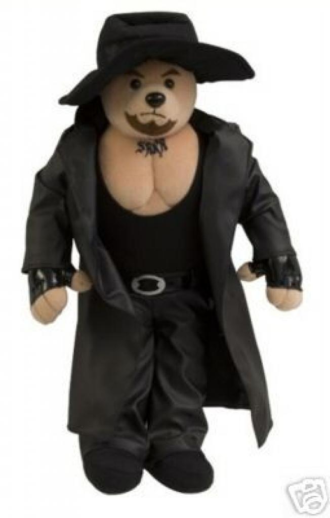 [19/04/2010] Undertaker TeddybärStofftier-Versionen von Spielfiguren sind schon lange keine Seltenheit mehr. Wenn es sich bei dem verstofften Kerlchen aber um einen knallharte Wrestler aus Smackdown vs. Raw im Plüschpelz handelt, hat es sich seinen Platz unter den schönsten Fan-Artikeln wohl redlich verdient. 