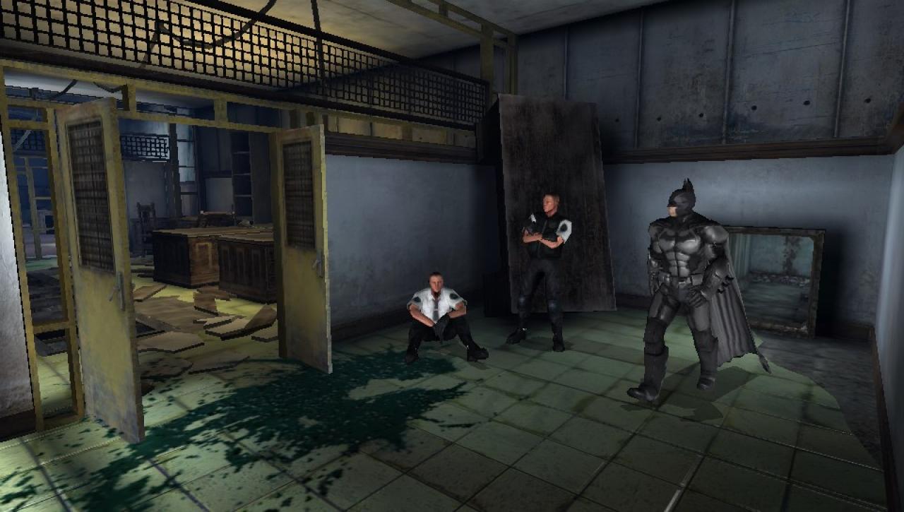 [28/10/2013] PS Vita: Batman marschiert auch hier auf einem festen Pfad vom Luftschacht rechts zur Tür links - trotz der 3D-Levels ist das Gameplay stets zweidimensional.