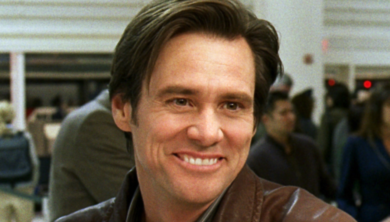 Jim Carrey grinst in die Kamera.