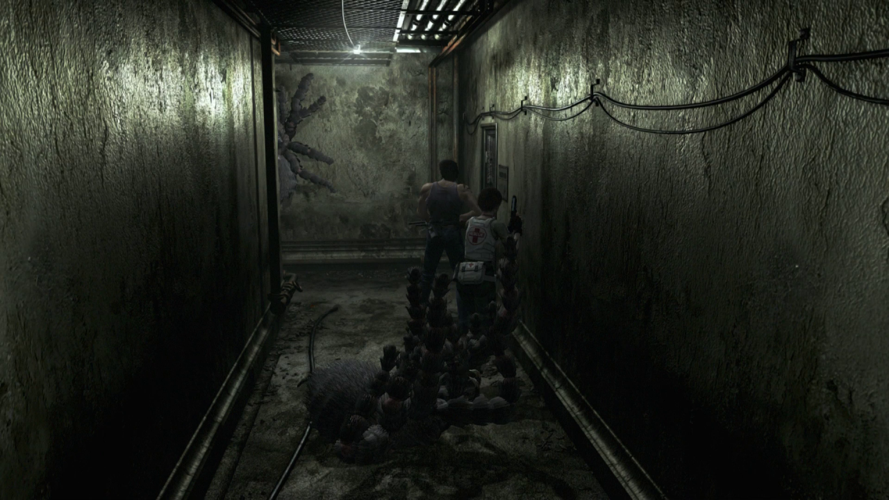 [18/01/2016] Resident Evil Zero mangelt es ein wenig an abwechslungsreichen Settings. Es erwarten euch viele graue Gänge wie dieser hier.