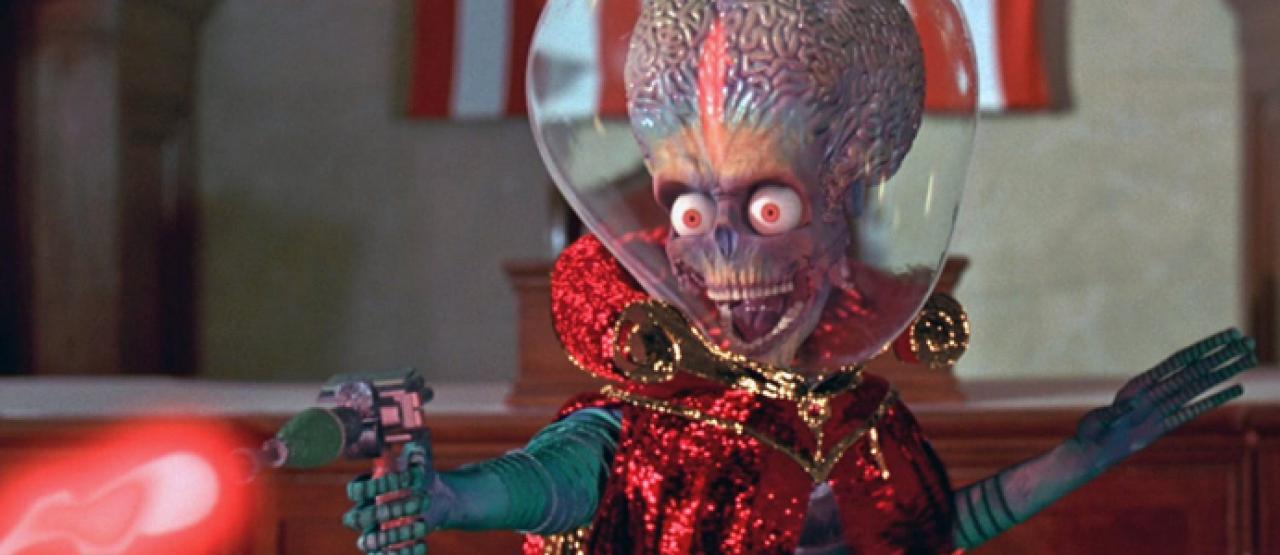 Ein Mars-Alien feuert auf die versammelten Politiker