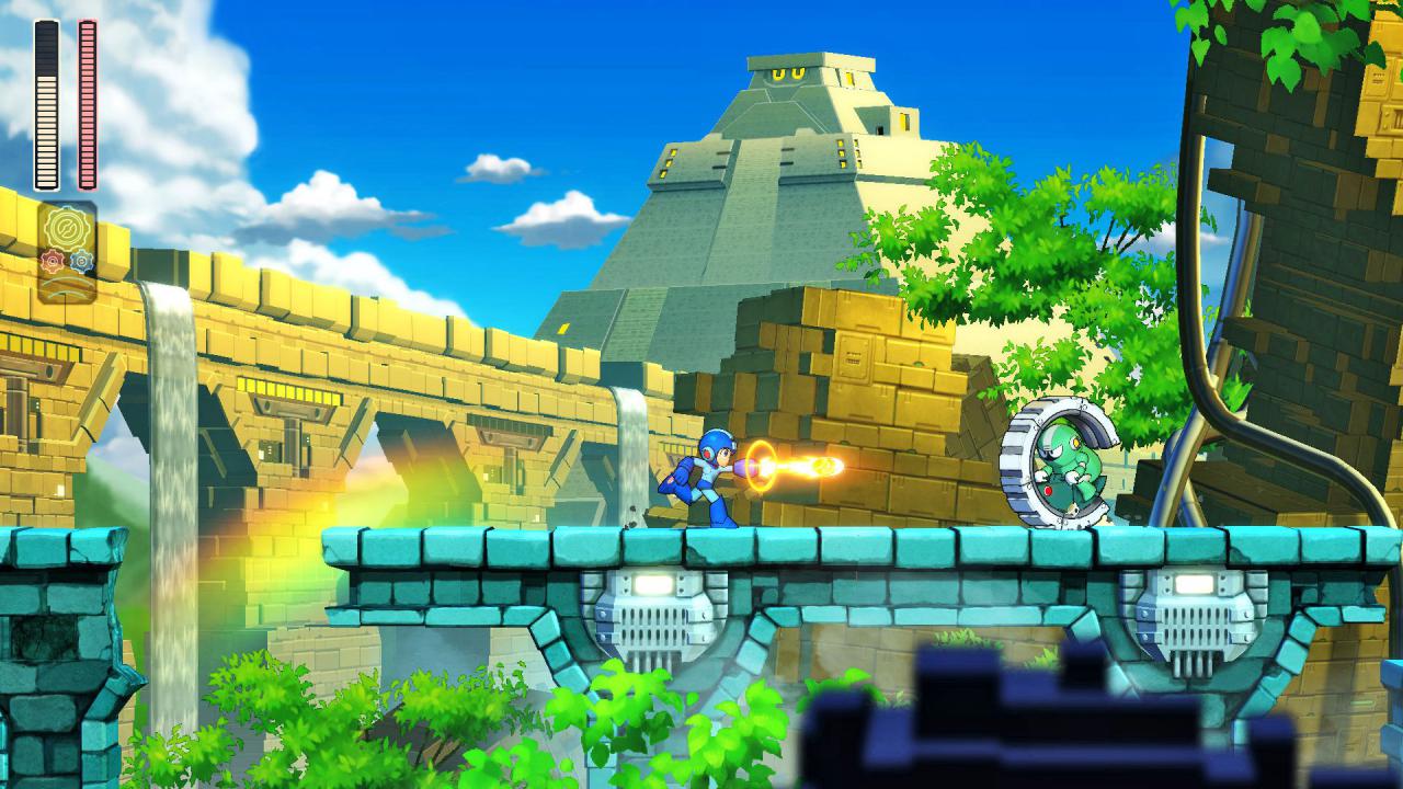 Mega Man läuft nach rechts und schießt auf ein Rad.