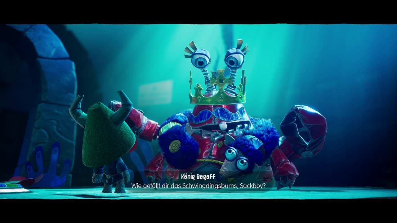 [19/11/2020] Im Verlaufe des Abenteuers trifft Sackboy auf allerhand herrlich alberne gestalten wie diesen raffgierigen Krabbenkönig, für den man Schätze aufspüren soll.