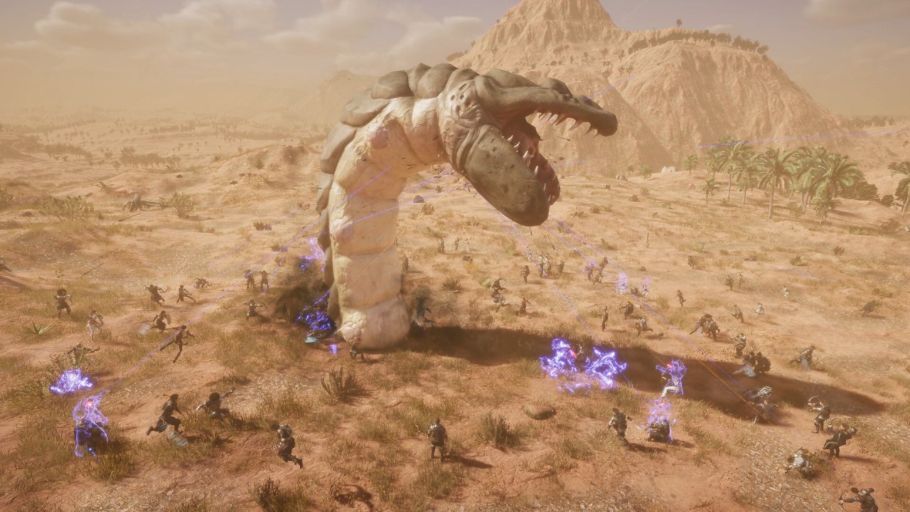 Eine Gruppe Spieler bekämpft einen riesigen Sandwurm.