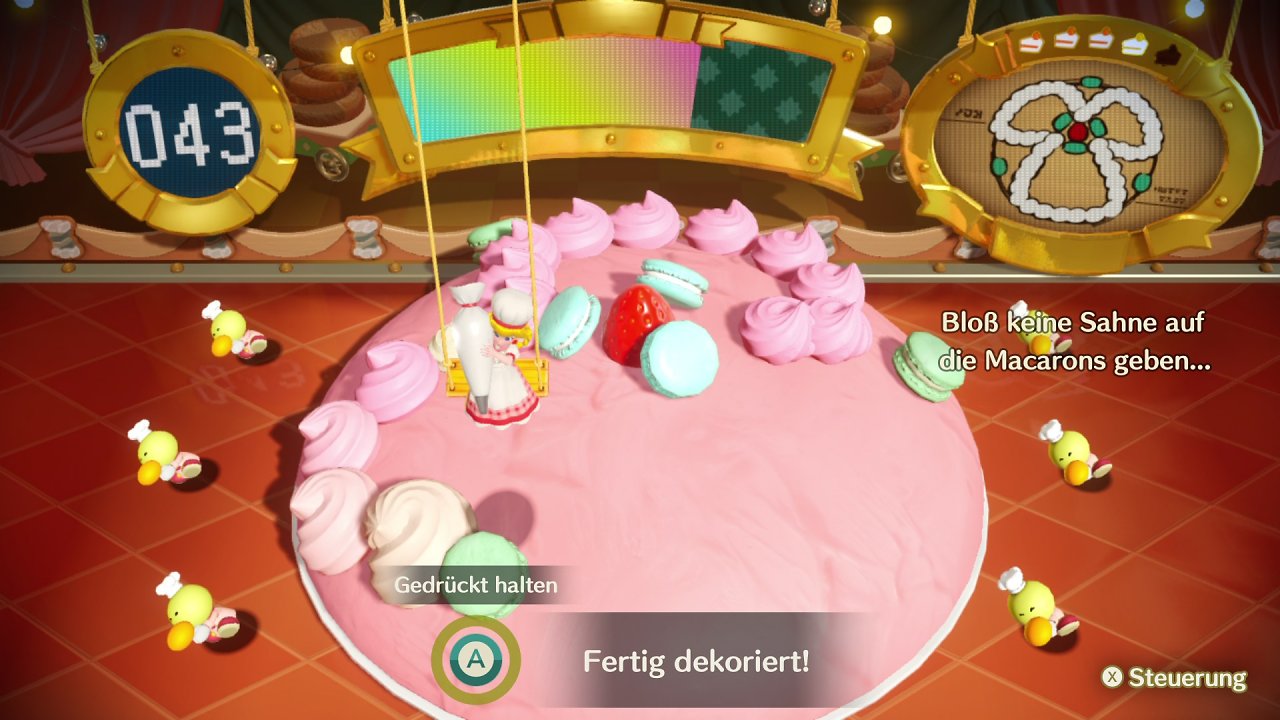 Patissière-Peach dekoriert eine riesige Torte