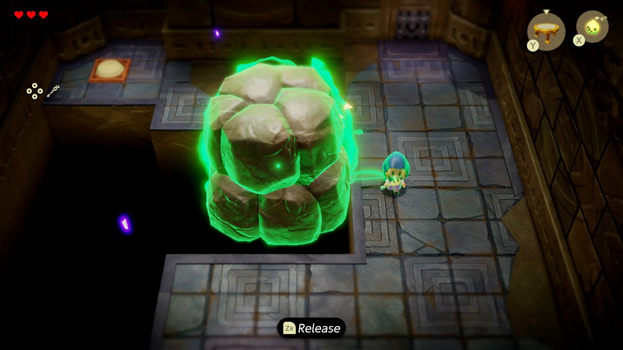 Zelda befindet sich im Einklang mit einem Felsen, wodurch sie ihn bewegen kann