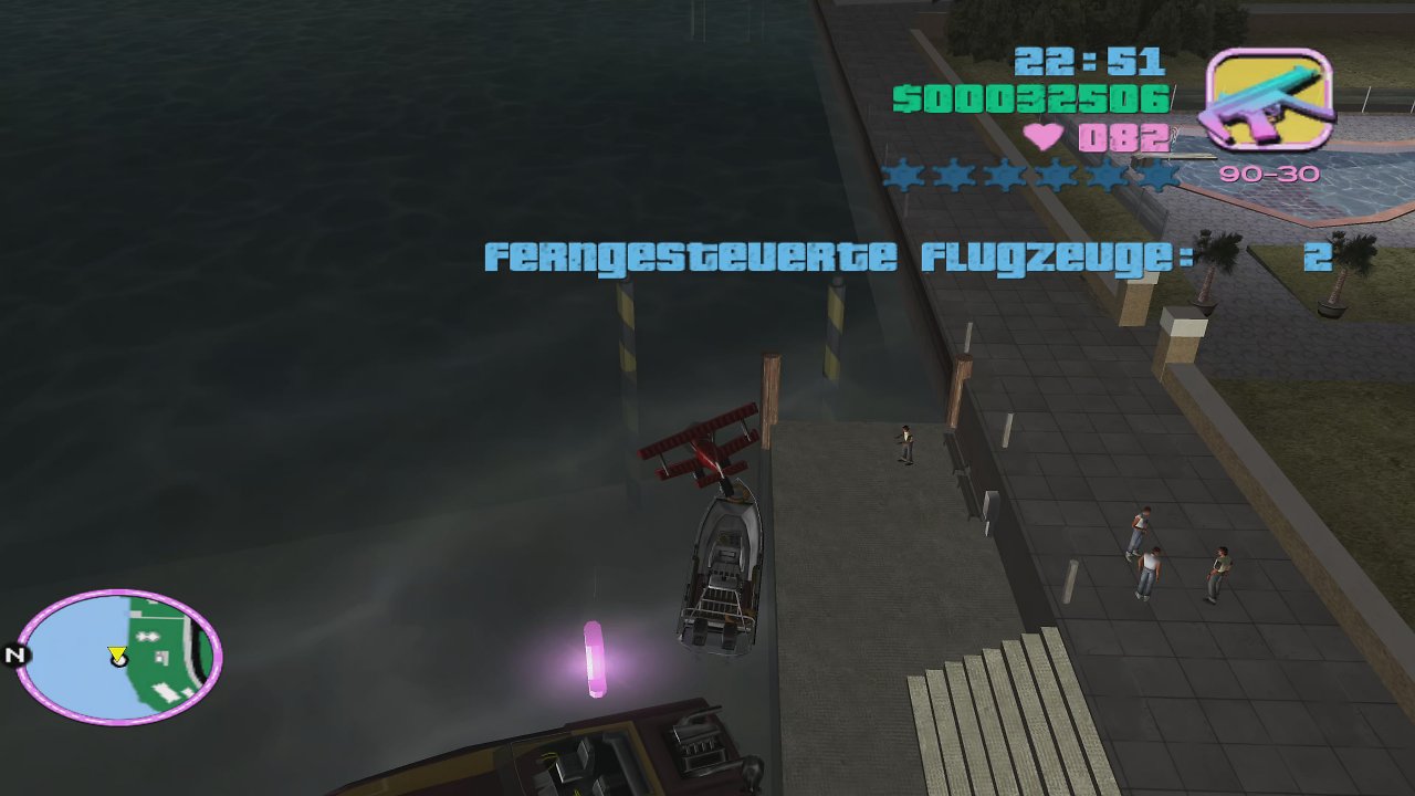 Ein Miniaturflugzeug wirft Bomben auf Boote