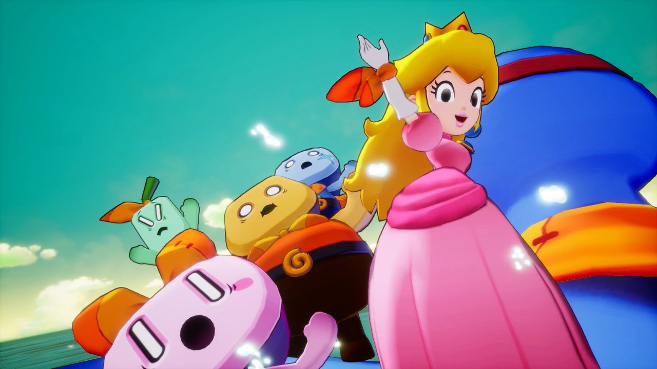 Peach steht neben einigen Bewohnern und winkt in die Kamera
