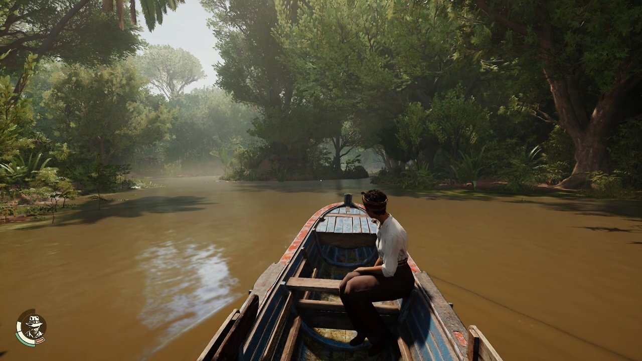 Indy sitzt mit Gina in einem Boot und fährt über einen Fluss.