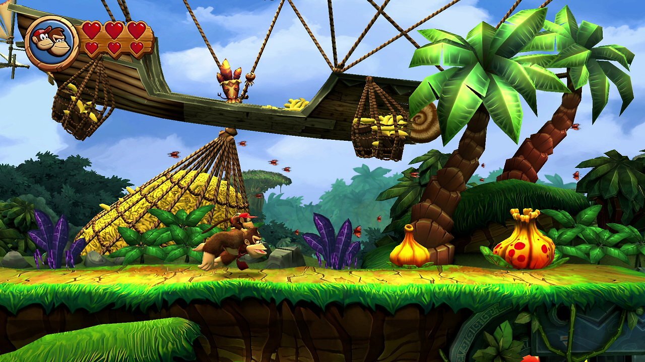 Donkey Kong und Diddy Kong laufen über eine Wiese