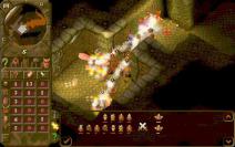 Ein Kampf bei Dungeon Keeper von oben.