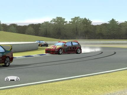 Colin? Dieses Bild könnte fast aus dem hei&szlig; erwarteten Rally-Spektakel Colin McRae 3 stammen - ein Focus beim Powerslide gibt aber auch in DTM eine gute Figur ab. 