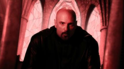 Der charismatische Bösewicht - Kane, gespielt von Joe Kucan.