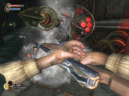 Handhabe - Die vorn herausragenden Arme sind in Shootern zwar üblich, in Bioshock aber besonders hübsch gelungen. Hier lädt der Held das Maschinengewehr nach.