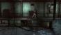 PS Vita: Durch Gitter im Boden schleicht sich Batman an seine Ziele heran.